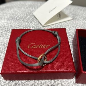 Cartier Trinity bracelet on cord